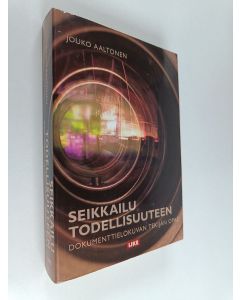 Kirjailijan Jouko Aaltonen käytetty kirja Seikkailu todellisuuteen : Dokumenttielokuvan tekijän opas