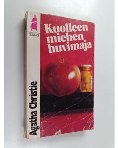 Kirjailijan Agatha Christie käytetty kirja Kuolleen miehen huvimaja
