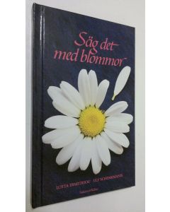 Kirjailijan Lotta Dimitriou käytetty kirja Säg det med blommor