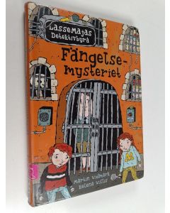 Kirjailijan Martin Widmark käytetty kirja Fängelsemysteriet