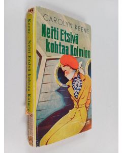 Kirjailijan Carolyn Keene käytetty kirja Neiti Etsivä kohtaa Kolmion