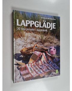 Kirjailijan Rie Norum käytetty kirja Lappglädje 30 fina projekt i lappteknik