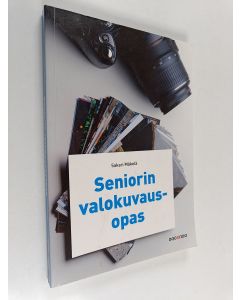 Kirjailijan Sakari Mäkelä käytetty kirja Seniorin valokuvausopas