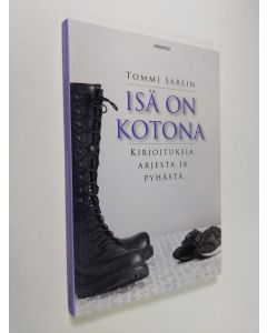 Kirjailijan Tommi Sarlin käytetty kirja Isä on kotona : kirjoituksia arjesta ja pyhästä