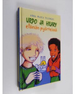 Kirjailijan Anna-Maria Telemäki käytetty kirja Urpo ja Hilary elämän pyörteissä