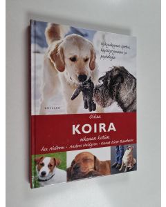 Kirjailijan Åsa Ahlbom käytetty kirja Oikea koira oikeaan kotiin : nykyaikainen opetus, käyttäytyminen ja psykologia