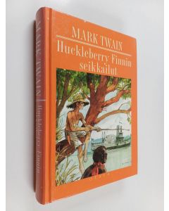 Kirjailijan Mark Twain käytetty kirja Huckleberry Finnin seikkailut
