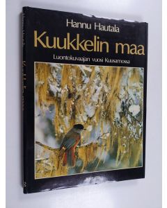 Kirjailijan Hannu Hautala käytetty kirja Kuukkelin maa : luontokuvaajan vuosi Kuusamossa