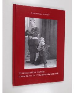 Kirjailijan Jussi-Pekka Alander käytetty kirja Punakaartien merkit, tunnukset ja varainkeräysmerkit