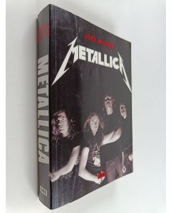 Kirjailijan Joel McIver käytetty kirja Metallica : thrashtitaanien tie maailman mahtavimmaksi metallibändiksi ja mitä sitten tapahtui