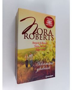 Kirjailijan Nora Roberts & Sharon Kendrick ym. käytetty kirja Aikamme yhdessä : Aamulla kello kolme ; Lääkäri saapuu kylään ; Kaksinkertainen nautinto ; Kutsu tanssiin