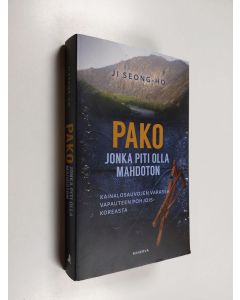 Kirjailijan Seong-ho Ji käytetty kirja Pako jonka piti olla mahdoton : kainalosauvojen varassa vapauteen Pohjois-Koreasta