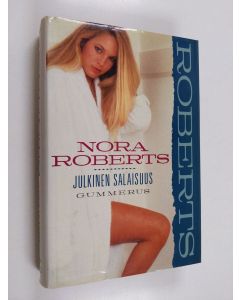 Kirjailijan Nora Roberts käytetty kirja Julkinen salaisuus