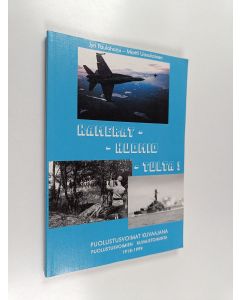 Kirjailijan Jyri Paulaharju käytetty kirja Kamerat - huomio - tulta! : puolustusvoimat kuvaajana : puolustusvoimien kuvaustoiminta 1918-1999