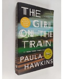 Kirjailijan Paula Hawkins käytetty kirja The Girl on the Train