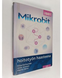 Kirjailijan Eliisa Karhumäki käytetty kirja Mikrobit hoitotyön haasteena