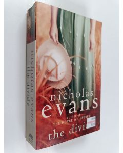 Kirjailijan Nicholas Evans käytetty kirja The divide