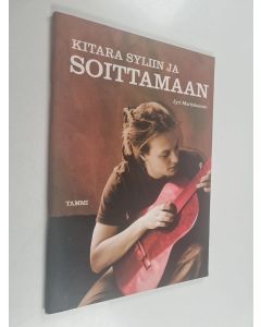 Kirjailijan Jyri Martiskainen käytetty teos Kitara syliin ja soittamaan (cd puuttuu)