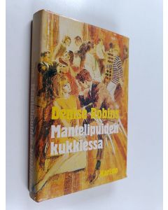 Kirjailijan Denise Robins käytetty kirja Mantelipuiden kukkiessa