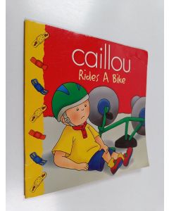 käytetty teos Caillou : Rides a bike