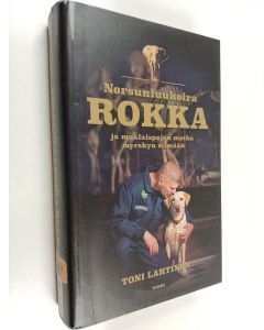 Kirjailijan Toni Lahtinen käytetty kirja Norsunluukoira Rokka ja maalaispojan matka myrskyn silmään