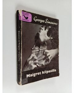 Kirjailijan Georges Simenon käytetty kirja Maigret kilpasilla : komissaario Maigret'n tutkimuksia