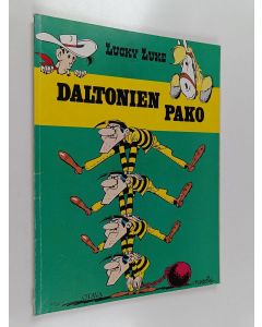 Kirjailijan Morris käytetty kirja Daltonien pako