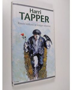 Kirjailijan Harri Tapper käytetty kirja Ruusu kädessä ja korppi toisessa