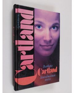 Kirjailijan Barbara Cartland käytetty kirja Sinisilmäinen noita