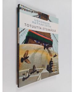 Kirjailijan Jyri ym. Komulainen käytetty kirja Uskonnon matkakirja : Totuutta etsimässä