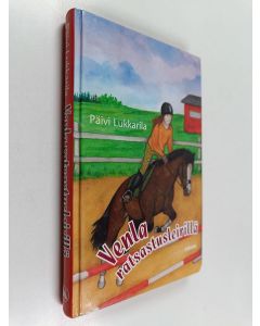 Kirjailijan Päivi Lukkarila käytetty kirja Venla ratsastusleirillä
