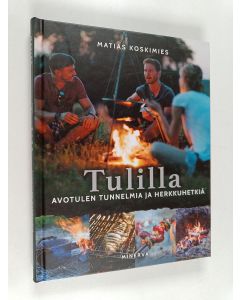 Kirjailijan Matias Koskimies käytetty kirja Tulilla : Avotulen tunnelmia ja herkkuhetkiä