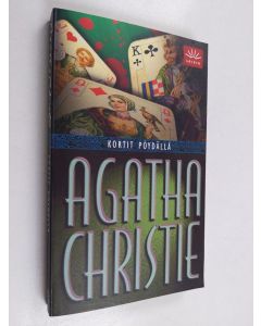 Kirjailijan Agatha Christie käytetty kirja Kortit pöydällä