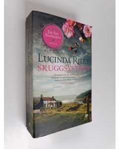 Kirjailijan Lucinda Riley käytetty kirja Skuggsystern : Stars bok