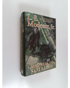 Kirjailijan L. E. Modesitt, Jr. käytetty kirja Madness in Solidar