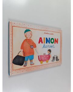 Kirjailijan Kristiina Louhi käytetty kirja Ainon kanssa