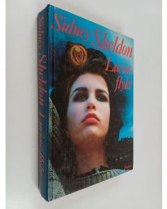 Kirjailijan Sidney Sheldon käytetty kirja Lucias flykt