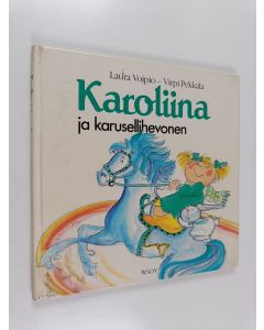Kirjailijan Laura Voipio käytetty kirja Karoliina ja karusellihevonen