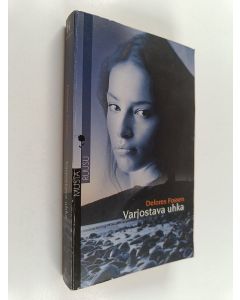 Kirjailijan Delores Fossen käytetty kirja Varjostava uhka