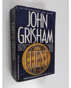Kirjailijan John Grisham käytetty kirja The client