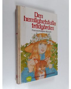 Kirjailijan Frances Hodgson Burnett käytetty kirja Den hemlighetsfulla trädgården