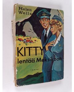 Kirjailijan Helen Wells käytetty kirja Kitty lentää Meksikoon