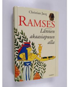 Kirjailijan Christian Jacq käytetty kirja Ramses : Lännen akaasiapuun alla