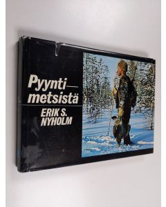 Kirjailijan Erik S. Nyholm käytetty kirja Pyyntimetsistä
