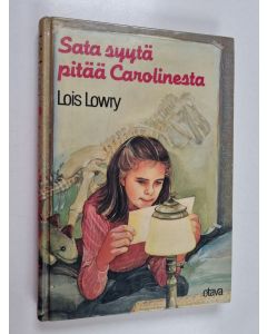 Kirjailijan Lois Lowry käytetty kirja Sata syytä pitää Carolinesta