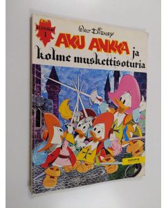 Kirjailijan Walt Disney käytetty kirja Aku Ankka ja kolme muskettisoturia