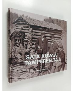 Kirjailijan Kari Nieminen käytetty kirja Sata kuvaa Tampereelta