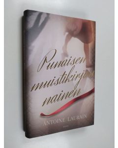 Kirjailijan Antoine Laurain käytetty kirja Punaisen muistikirjan nainen