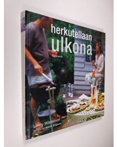Kirjailijan Lindy Wildsmith käytetty kirja Herkutellaan ulkona