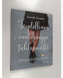 Kirjailijan Hannele Lampela käytetty kirja Täydellinen vaatekaappi tuhlaamatta : onnellisen ostamisen salaisuus